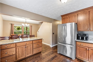 Open-concept dining and kitchen, granite counterto