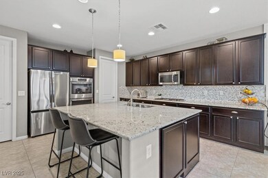 Kitchen with tasteful backsplash, visible vents, a