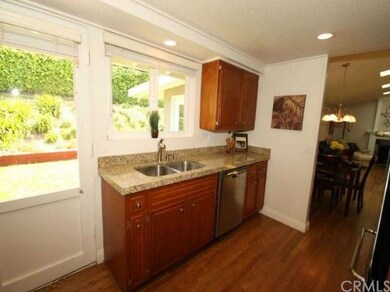 Kitchen looks out to the rear yard