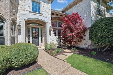 Property entrance featuring stone siding