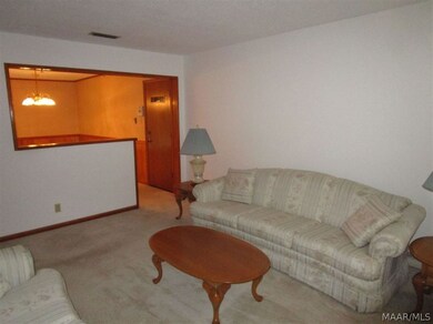 Living room w/half wall to dining room