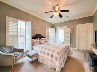 First floor spacious bedroom with soft gray walls