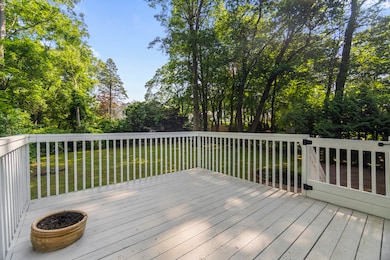 Deck off of your dining room with stairs down to the patio and backyard