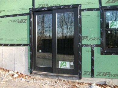 Exterior Back. Close up of the walkout of the base