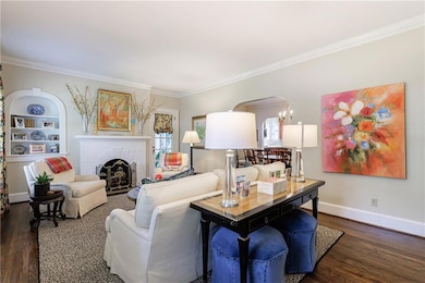 Fireside Living room with period fireplace surround and book shelves