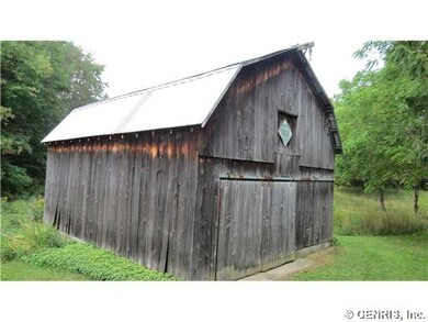 Barn. Barn has metal roof, large storage loft, con