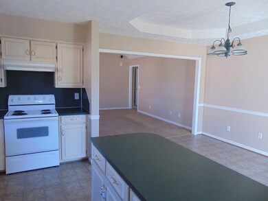 kitchen island looking toward eat in area