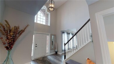 Two-story foyer.