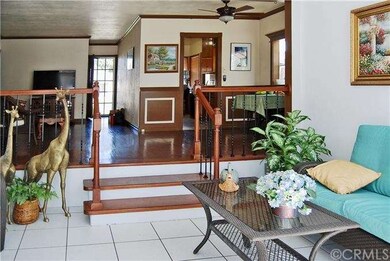 Family room/sun room facing kitchen, dining area, 