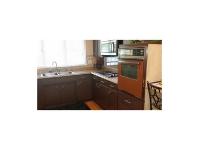 kitchen with newly painted cabinets