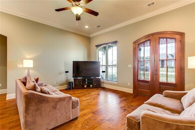 Beautiful front doors enter into open floorplan wi