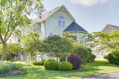 View of front of house with a front yard