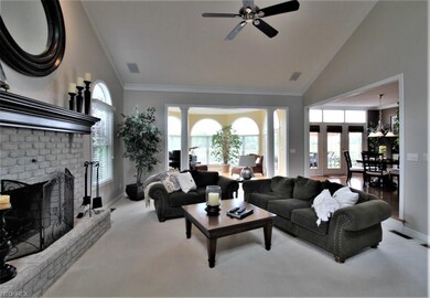 Family Room Opens to Sunroom and Kitchen Areas