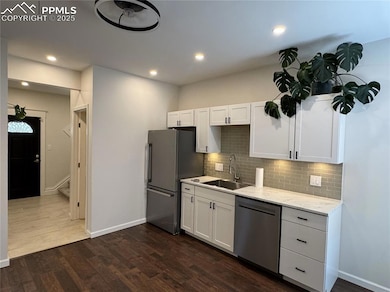 Stainless appliances and perfectly placed lighting