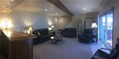 Finished game room walks out to covered patio