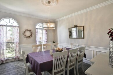 dining room with beautiful transom windows