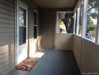 Inside front screened-in porch