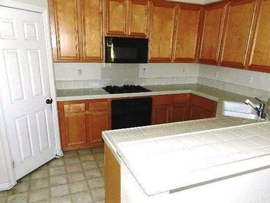 Kitchen with pantry, built-in appliances and ample