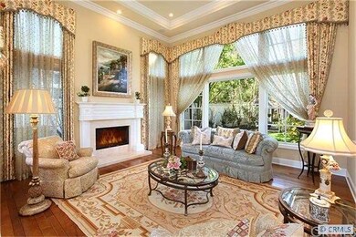 Living room with Richard Marshall hardwood floorin