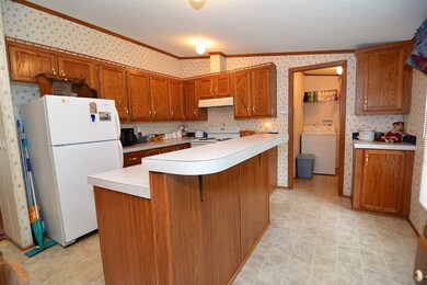 Large kitchen with plenty of storage.