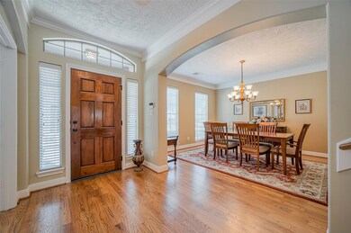 Bright foyer opens into this spacious dining room