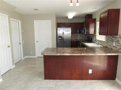 13314 Thoroughbred Loop, Largo, FL 33773 - photo 6