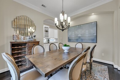 Dining room open to butlers pantry and kitchen.