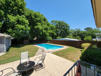 Outdoor patio beside the pool