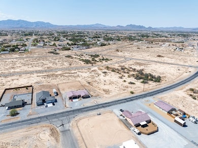 View of rural area with mountains and nearby suburban area