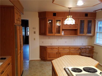 SO MANY CABINETS FOR STORAGE AND LIGHTED DISPLAY O