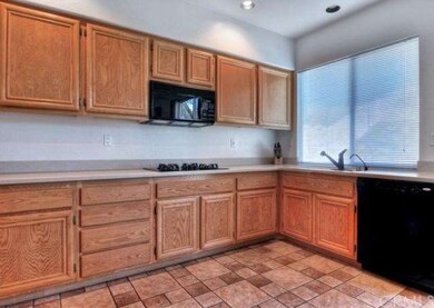 The kitchen boasts upgraded Corian counter tops an