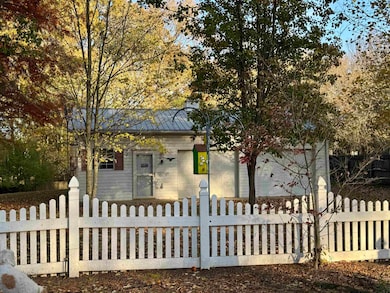 An area of the yard is fenced off