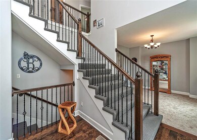 Breathtaking staircase with iron spindles and desi