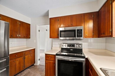 KITCHEN LOOKING INTO DINING ROOM