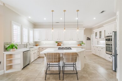 The gas cooktop sits in the island making it the perfect spot to cook while also visiting with friends and family.