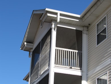 View of side of the building and the screen porch.