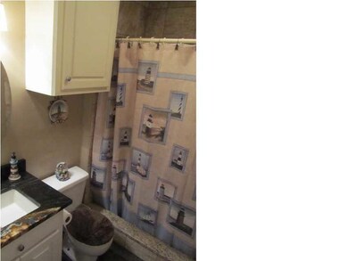 guest bathroom with new tile and granite
