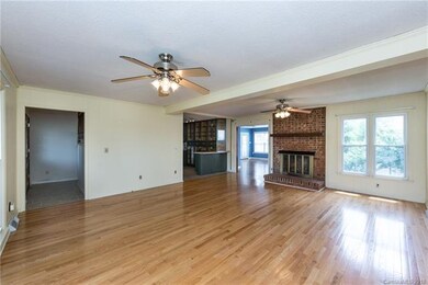 Great room with hardwoods and a gas fireplace (use