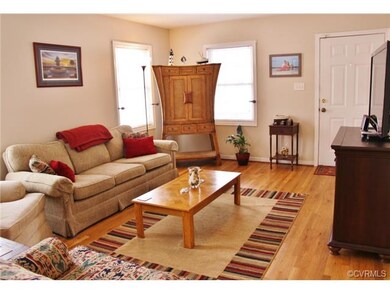16 x 12 Living room with oak hardwood floors and f