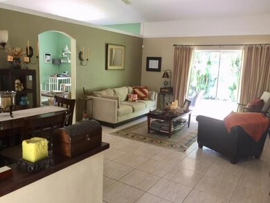 LIVING AREA WITH GARDEN VIEW