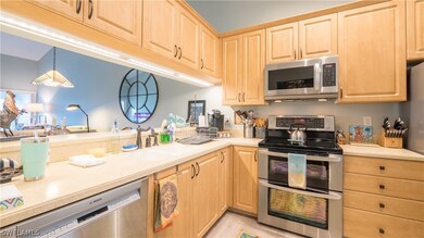 Corian counter tops, stainless steel appliances, a