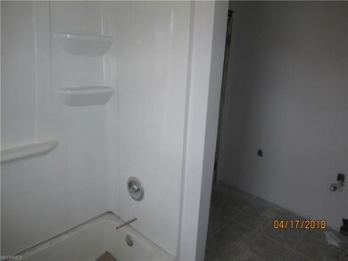 new shower and tub in each unit