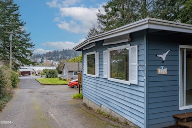 Side of Home & Shared Driveway