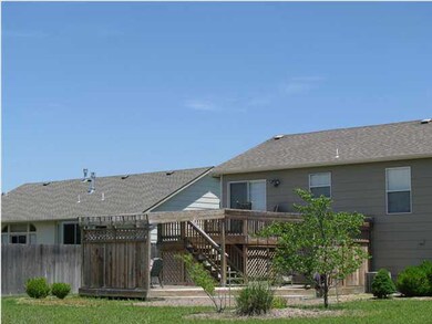 Huge Custom Deck w/ brick patio area.