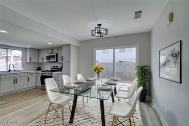 Dining area with baseboards, visible vents, recess