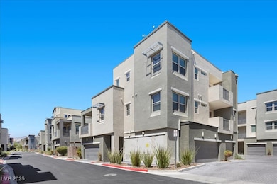View of building exterior featuring a garage