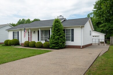 Roof is brand new in April.  Detached Garage and Aggregate Driveway
