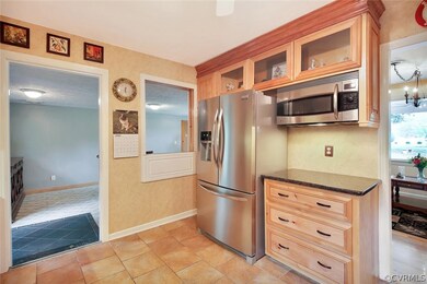 Kitchen with Tile Flooring, Granite Countertops, S