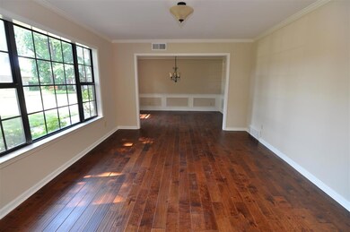 A large window offers a great view of the front ya