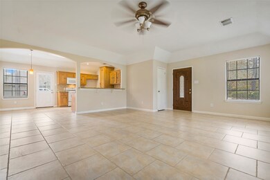 Living area facing the kitchen and dining